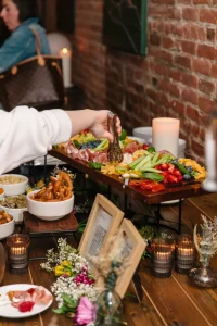 A premium display of cheeses and meats curated for a private dining function.