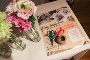 Close-up of brand catalogs and lifestyle imagery used for storytelling at a retail pop-up.