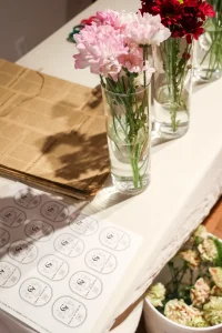 Close-up of brand catalogs and lifestyle imagery used for storytelling at a retail pop-up.