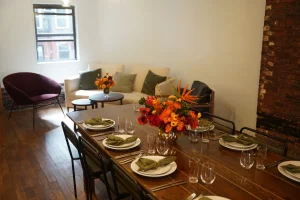 A hybrid lounge and dining setup for a modern private event flow.