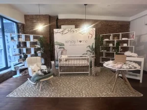 Staged bedroom environment featuring luxury bedding and lighting for a media and influencer preview.