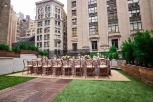 The LOFT39 terrace prepared for a high-level executive dinner under the stars.