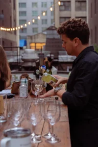 Signature cocktail service and professional bar infrastructure for a corporate happy hour.