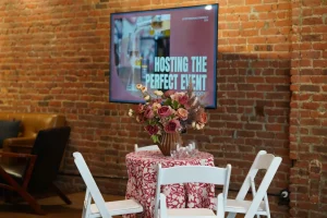 Corporate mixer and social gathering at a luxury Midtown event venue with an industrial chic aesthetic.