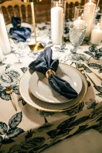 A chic nighttime elopement ceremony location with bistro string lights and a view of the Salesforce tower.