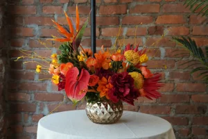 Detailed shot of a vibrant, tropical-inspired floral arrangement for a boutique wedding at a Midtown Manhattan venue.