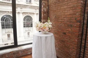 High-end charcuterie and artisan cheese board display for an intimate wedding reception in a New York City loft.