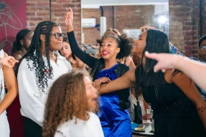 High-energy live DJ spinning tracks at a modern girls Bat Mitzvah party inside a luxury Midtown Manhattan loft venue.