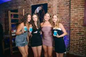 Sleek modern DJ booth and premium sound system setup for a high-octane teen milestone birthday party at LOFT39.