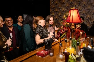 HR teams and executives dressed up for a luxury end-of-year company appreciation event.